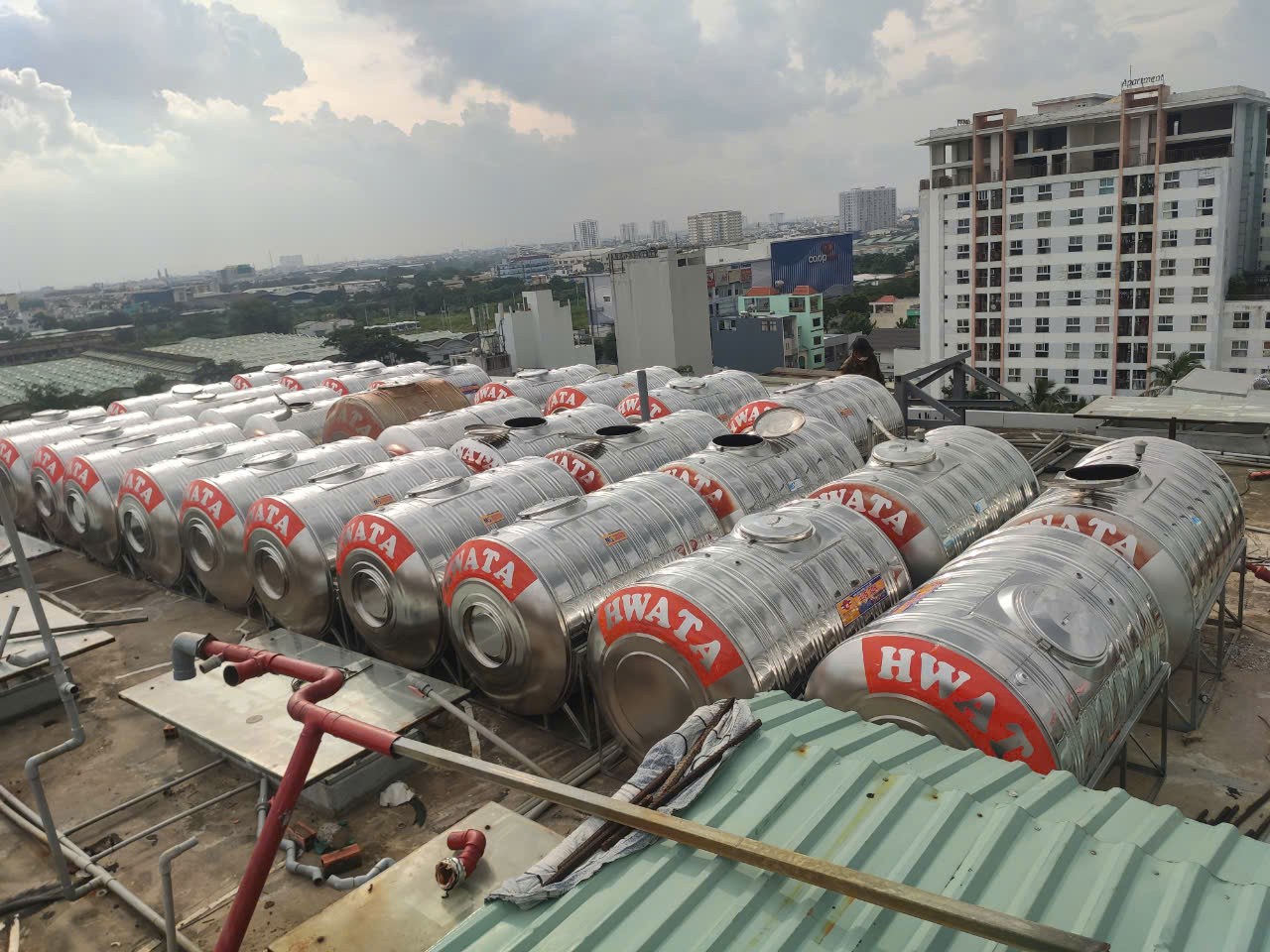 Vận chuyển cẩu lắp bồn inox 8 khối ngang